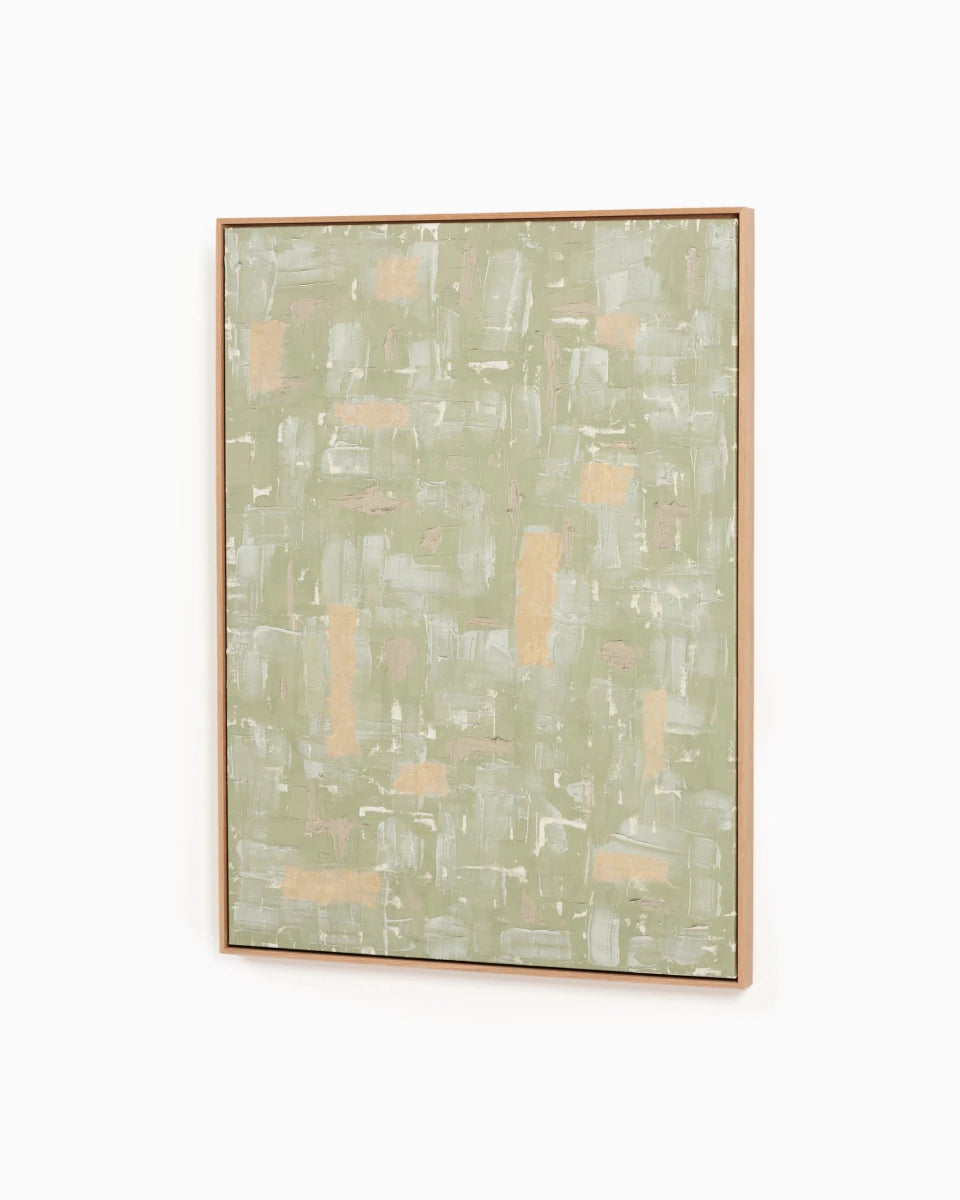 Abstract painting with soft green, white, and peach tones featuring layered rectangular brushstrokes in a natural wood frame.